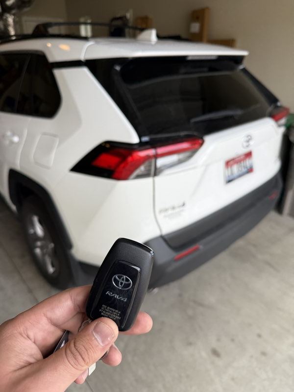 Toyota smart key replacement programmed beside a RAV4 in Coeur d'Alene